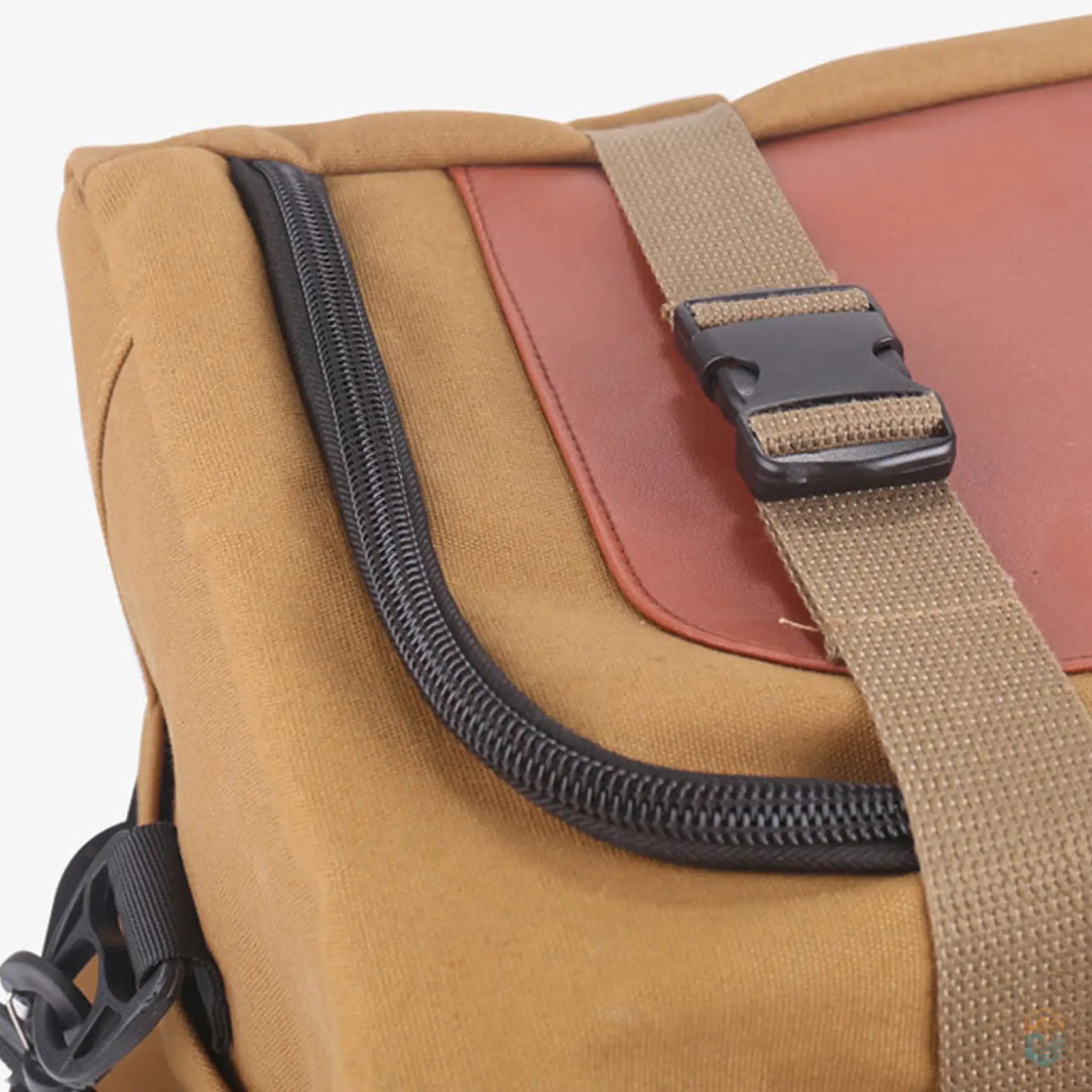 Close-up of the brown Hikeman 120L large camping storage bag, focusing on the secure buckle and durable zipper.