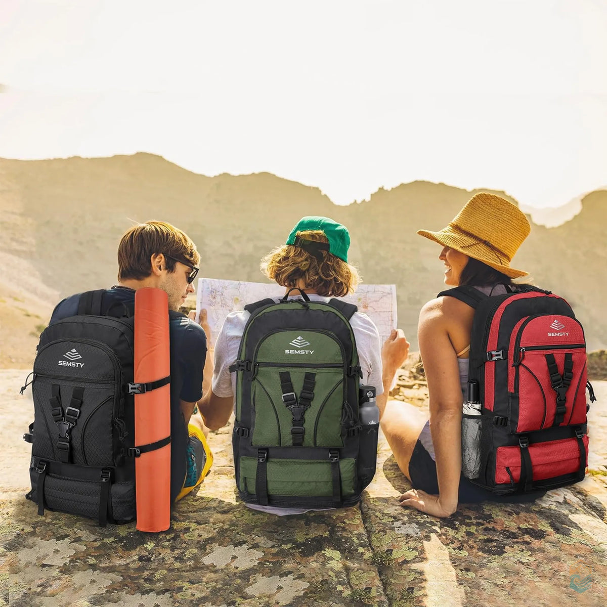Three hikers sitting on a rocky mountain trail with Semsty hiking backpacks in black, green, and red, studying a map under the sun—showcasing the backpacks in a real outdoor adventure setting.