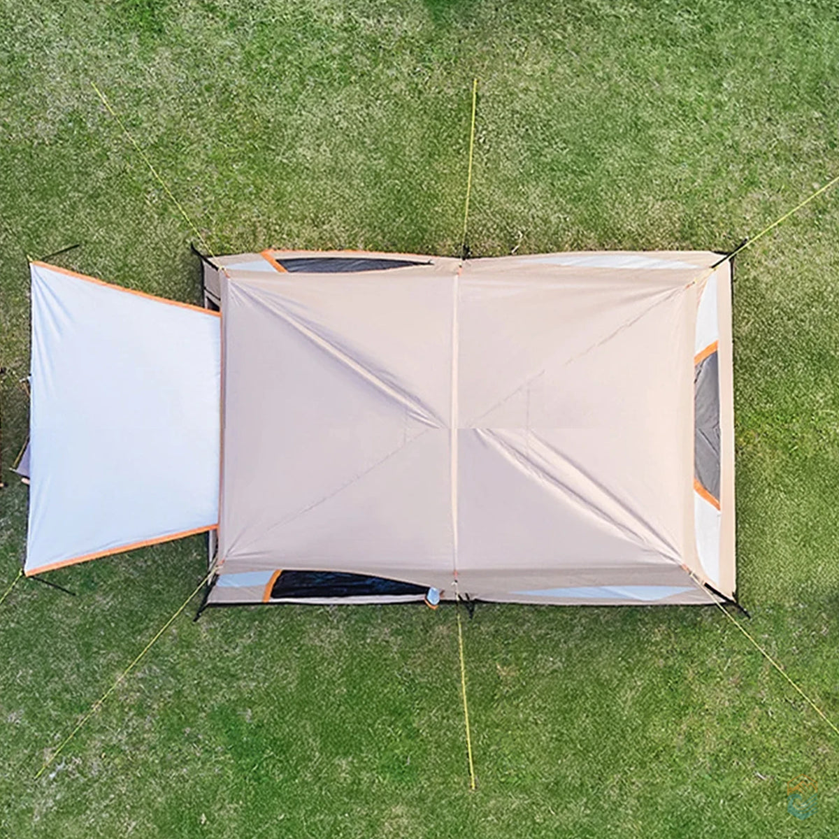 Top-down aerial view of Sonuto khaki family camping tent with extended front canopy and corner stakes secured on grassy field