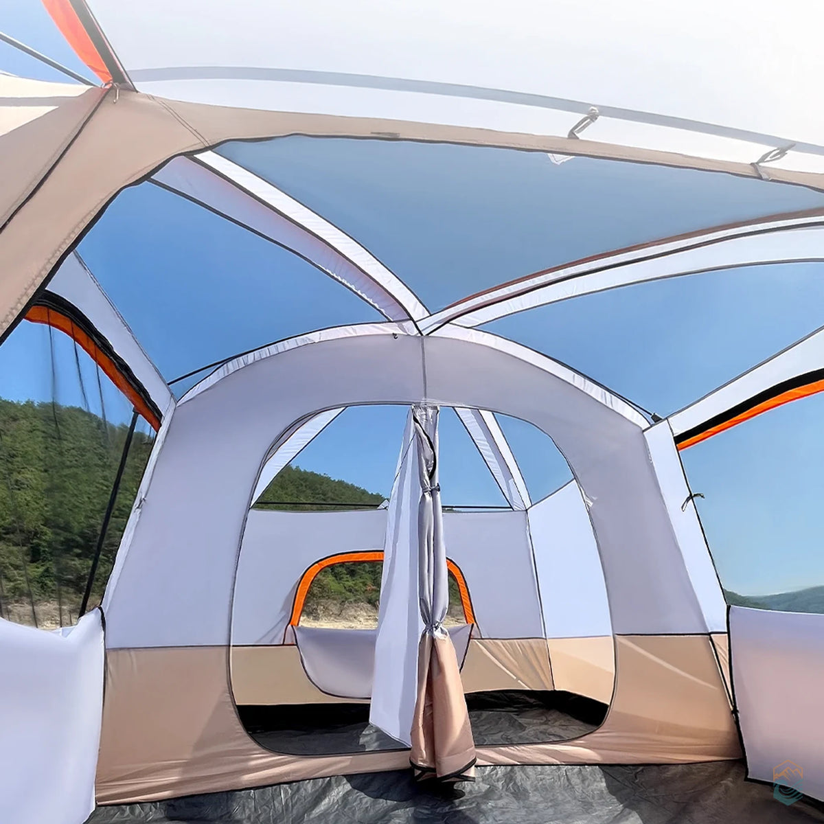 Wide angle interior view of Sonuto khaki family camping tent showing skylight mesh ceiling panels and two-room divider with mountain backdrop