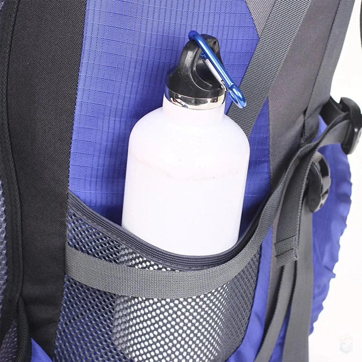 Close-up of side pocket on 50L waterproof hiking backpack in light purple and gray, featuring a mesh pocket securely holding a water bottle with a carabiner clip, ideal for easy access during outdoor adventures.