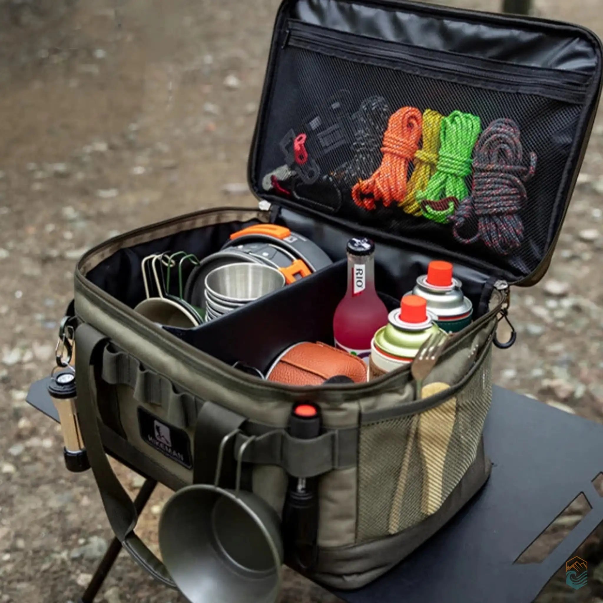 HIKEMAN cooler bag opened, fully packed with camping essentials such as cookware, ropes, gas canisters, and bottles, ready for an outdoor adventure.