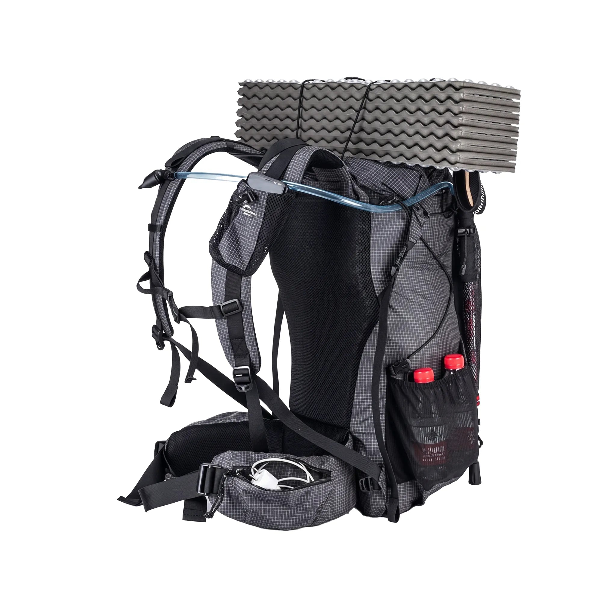 Rear view of the Naturehike 60L+5L ultralight hiking backpack in black loaded with a foam sleeping pad, hydration tube, water bottles, and trail essentials on a white background.