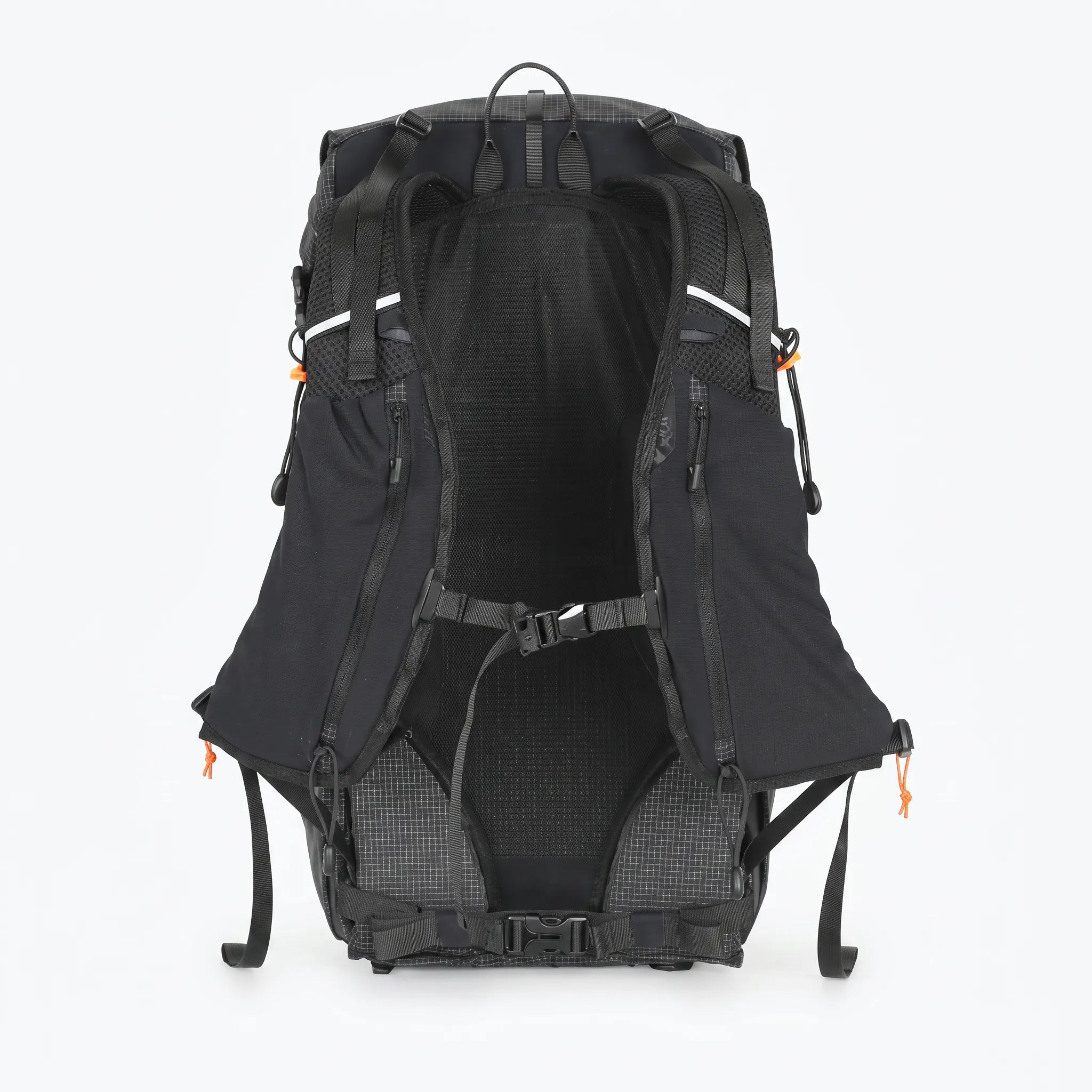 Back view of black Outdoor Inoxto 25L hiking backpack with padded shoulder straps, breathable back panel, chest strap, and hip belt.