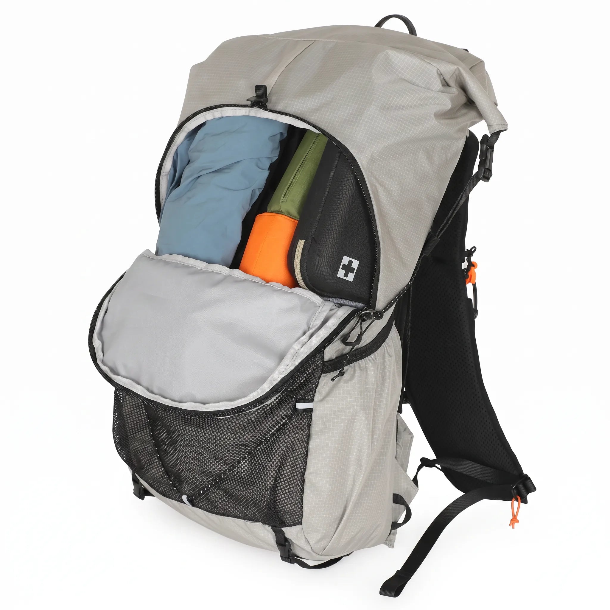Gray Outdoor Inoxto 25L hiking backpack with front compartment open showing organized camping and hiking gear storage.