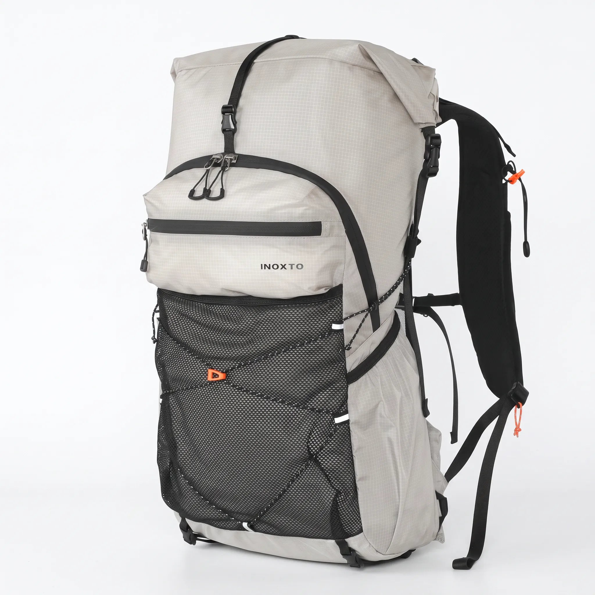 Gray Outdoor Inoxto 25L lightweight hiking backpack with large mesh front pocket, padded shoulder straps, and compression straps.