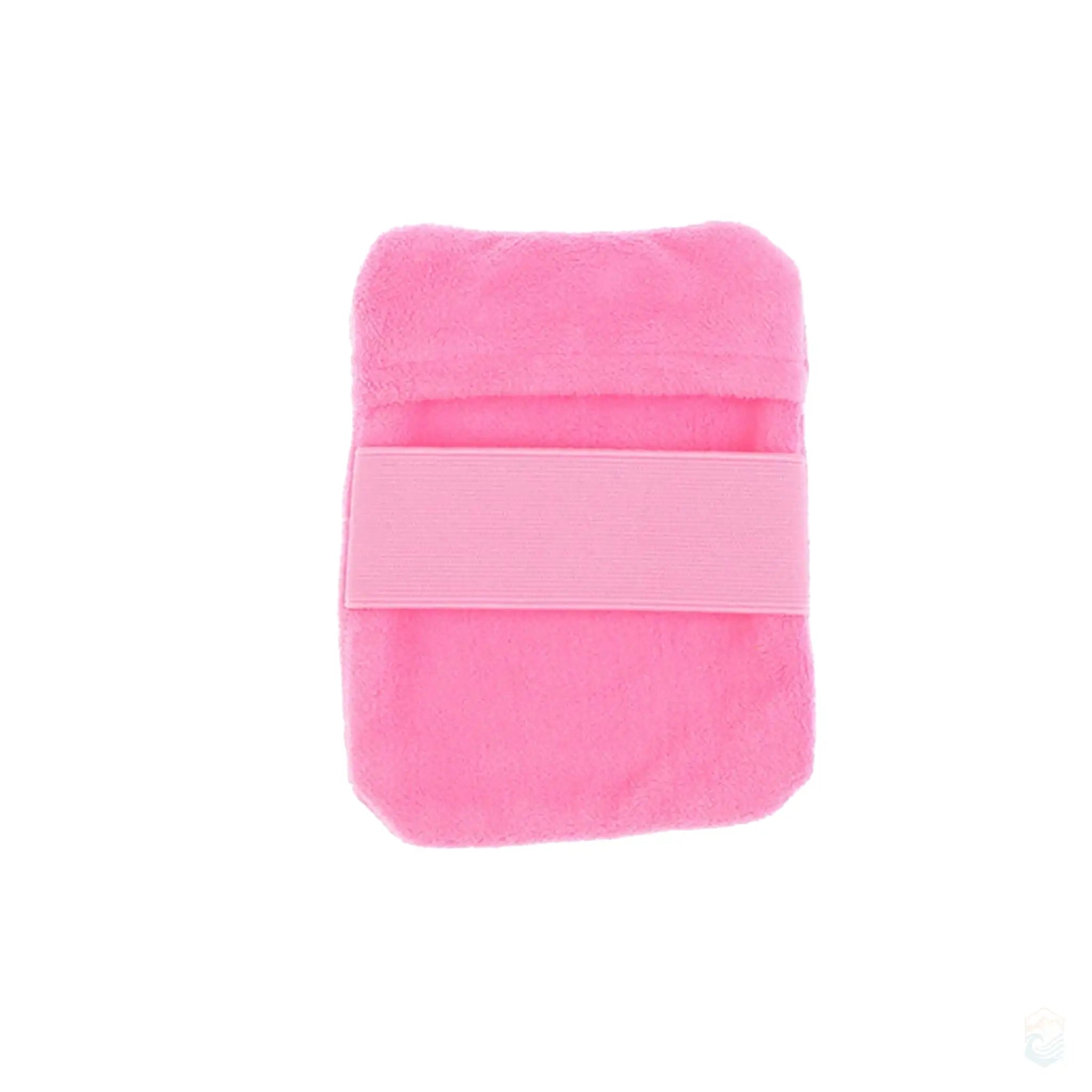 Large pink rectangular beach sand remover hand pad, featuring a soft and plush surface with a wide elastic strap, ideal for efficient and gentle sand removal during beach activities.