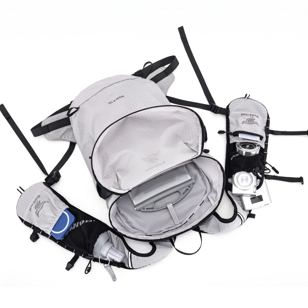 Open World Road 15L Urban Outdoor Hiking Backpack in white showing the main storage compartment, shoulder strap pockets, and organized gear storage.